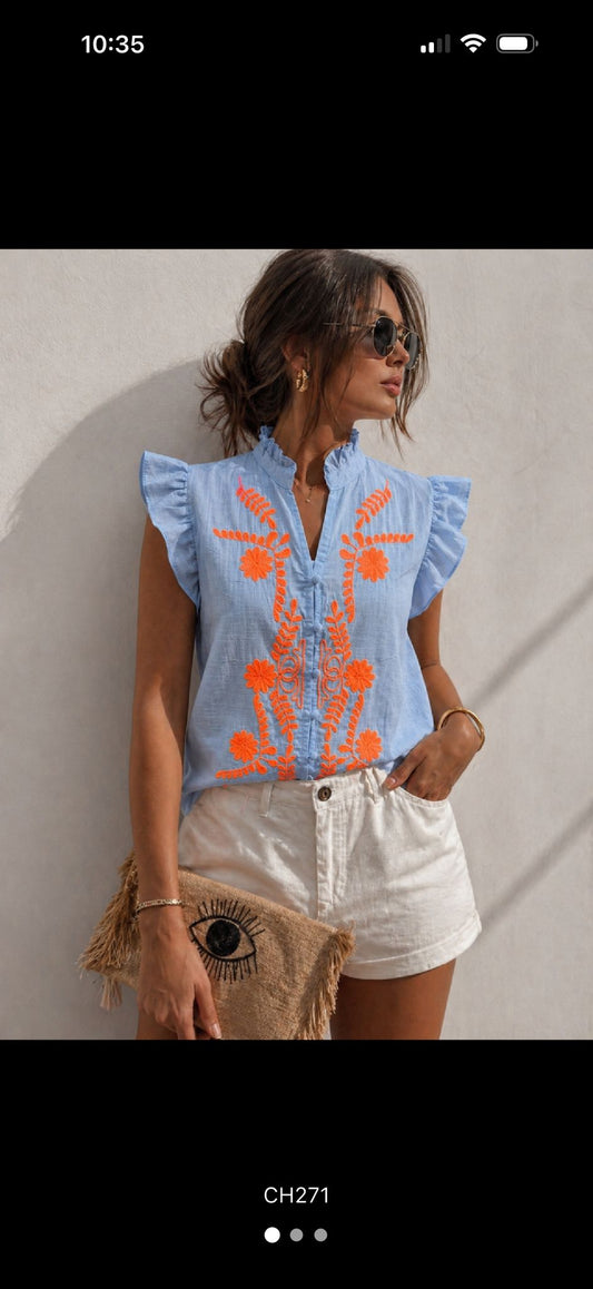 Chemise brodée col volanté avec détail signature