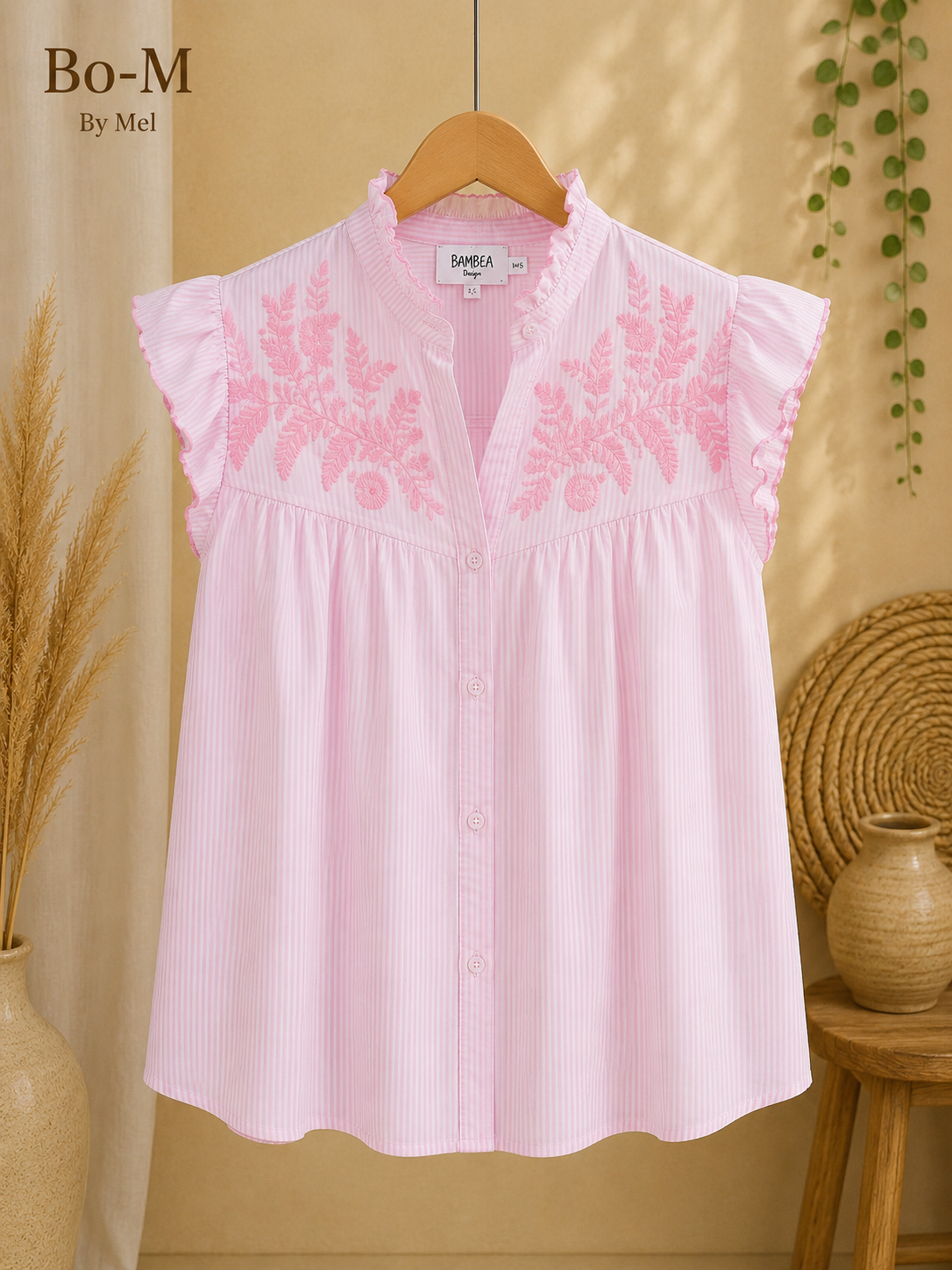 Chemise sans manches à fines rayures et col montant